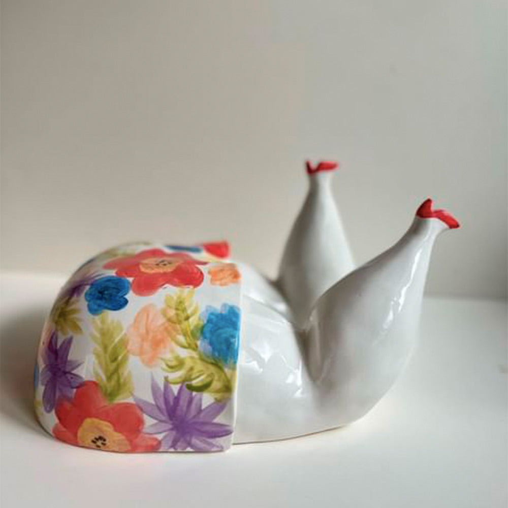 Sculpture Dame avec robe à fleurs et talons